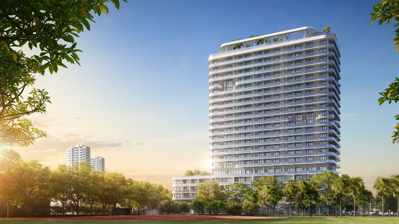 Rendering of the 72 Park tower in North Beach, Miami Beach, framed by trees at sunrise