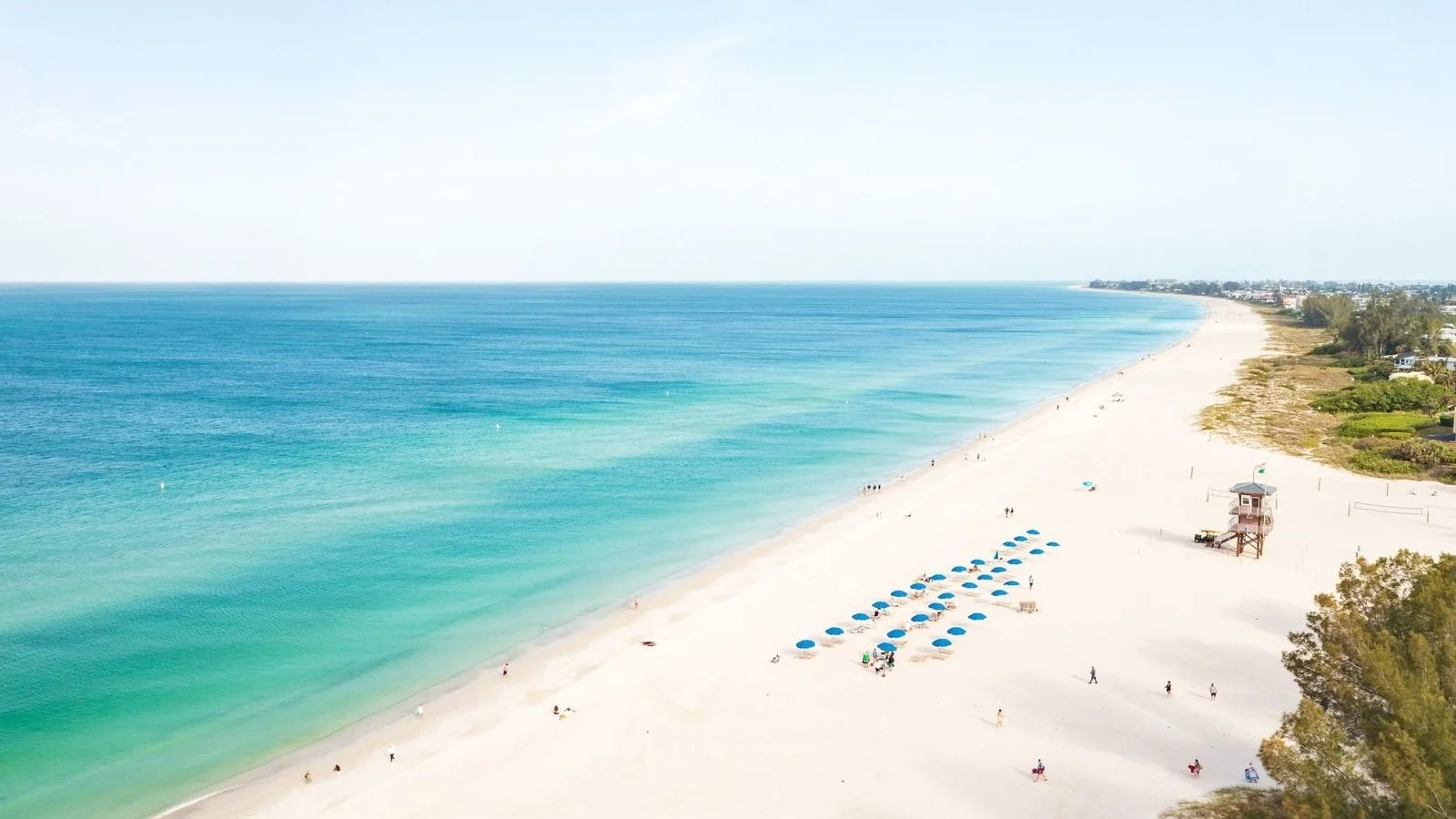 Aerial view of Manatee Beach on Anna Maria Island with its lifeguard stand and turquoise Gulf water