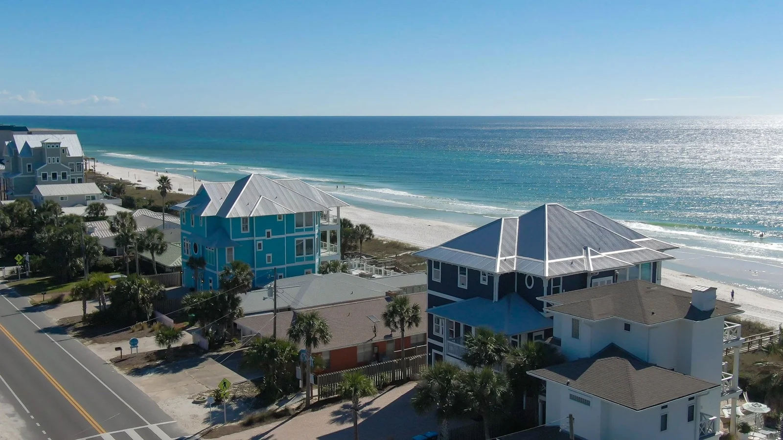 Beach houses beside the white sand and Gulf of Mexico in Panama City Beach, Bay County