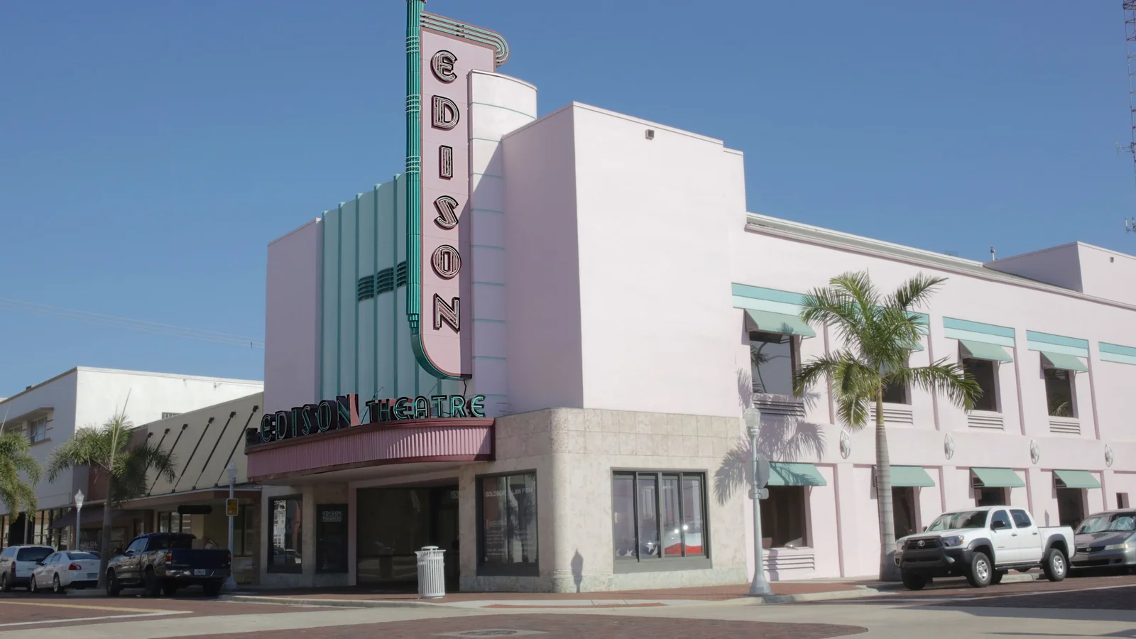 Art deco Edison Theatre building on a downtown Fort Myers street.