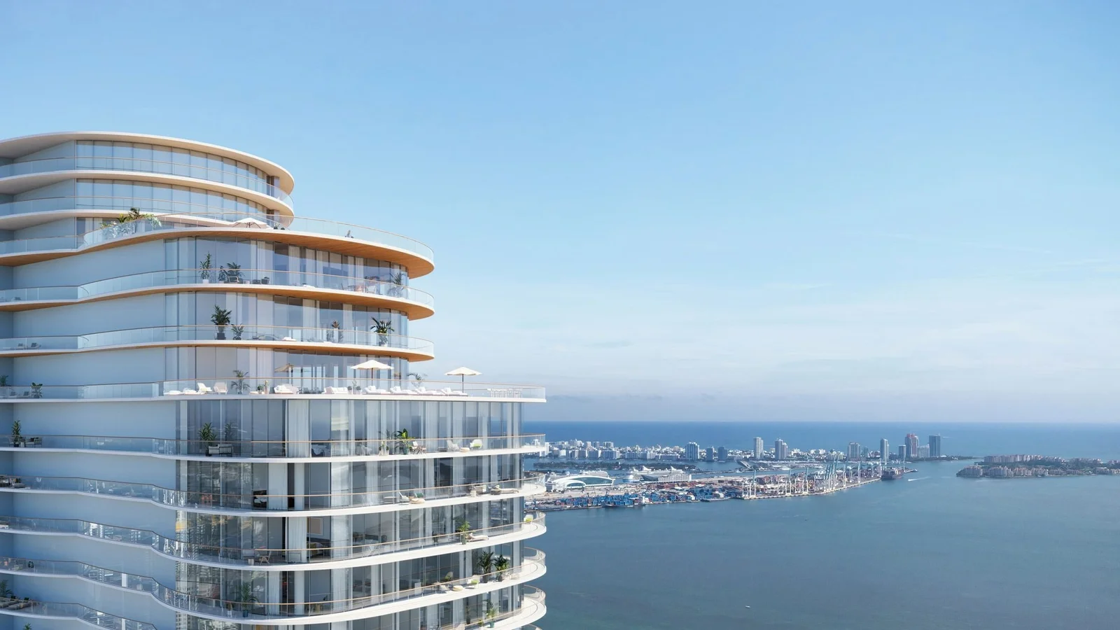 Rendering of the upper floors of Cipriani Residences Miami, with curved terraces overlooking Biscayne Bay.