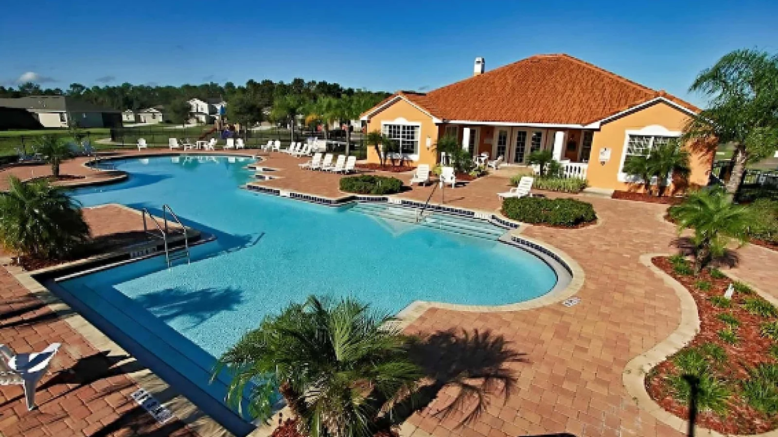 Clubhouse and free-form community pool at Crystal Cove Resort in Kissimmee.