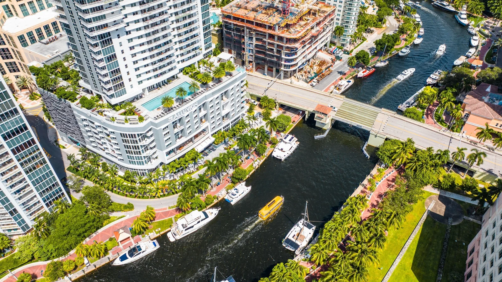 Aerial view of Las Olas Boulevard bridge over the New River in Fort Lauderdale with condo towers