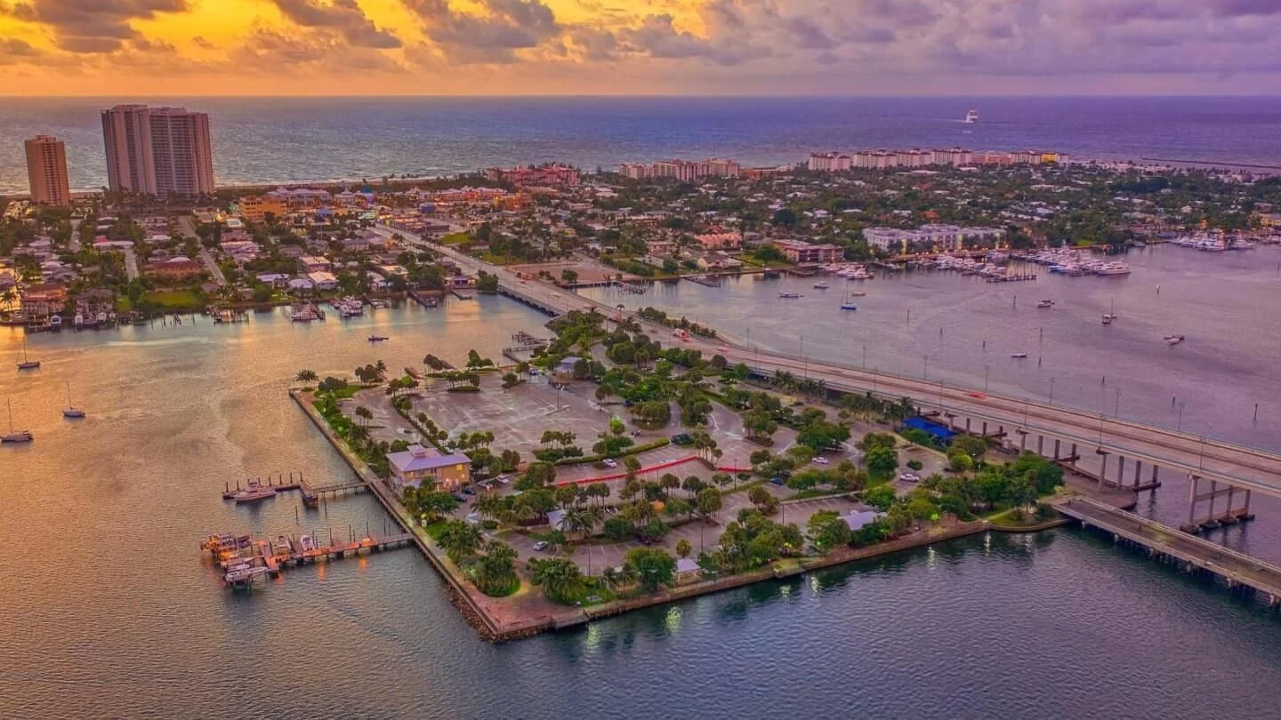 Peanut Island in the Lake Worth Lagoon at sunrise with Palm Beach County shoreline behind