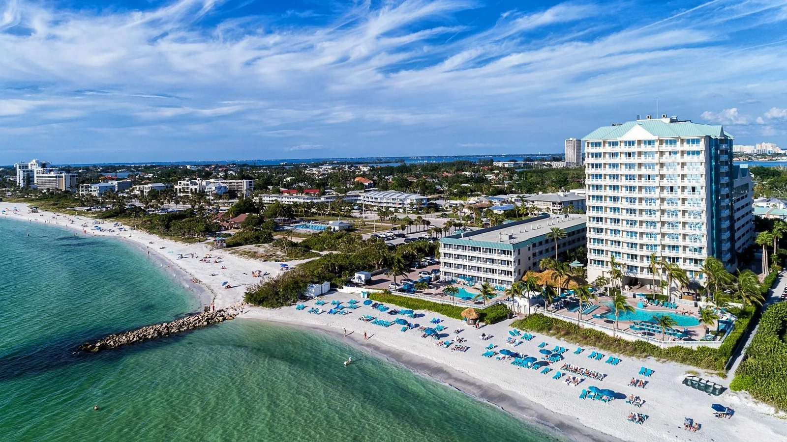 Aerial view of a beachfront resort and white sand beach on Lido Key, Sarasota.