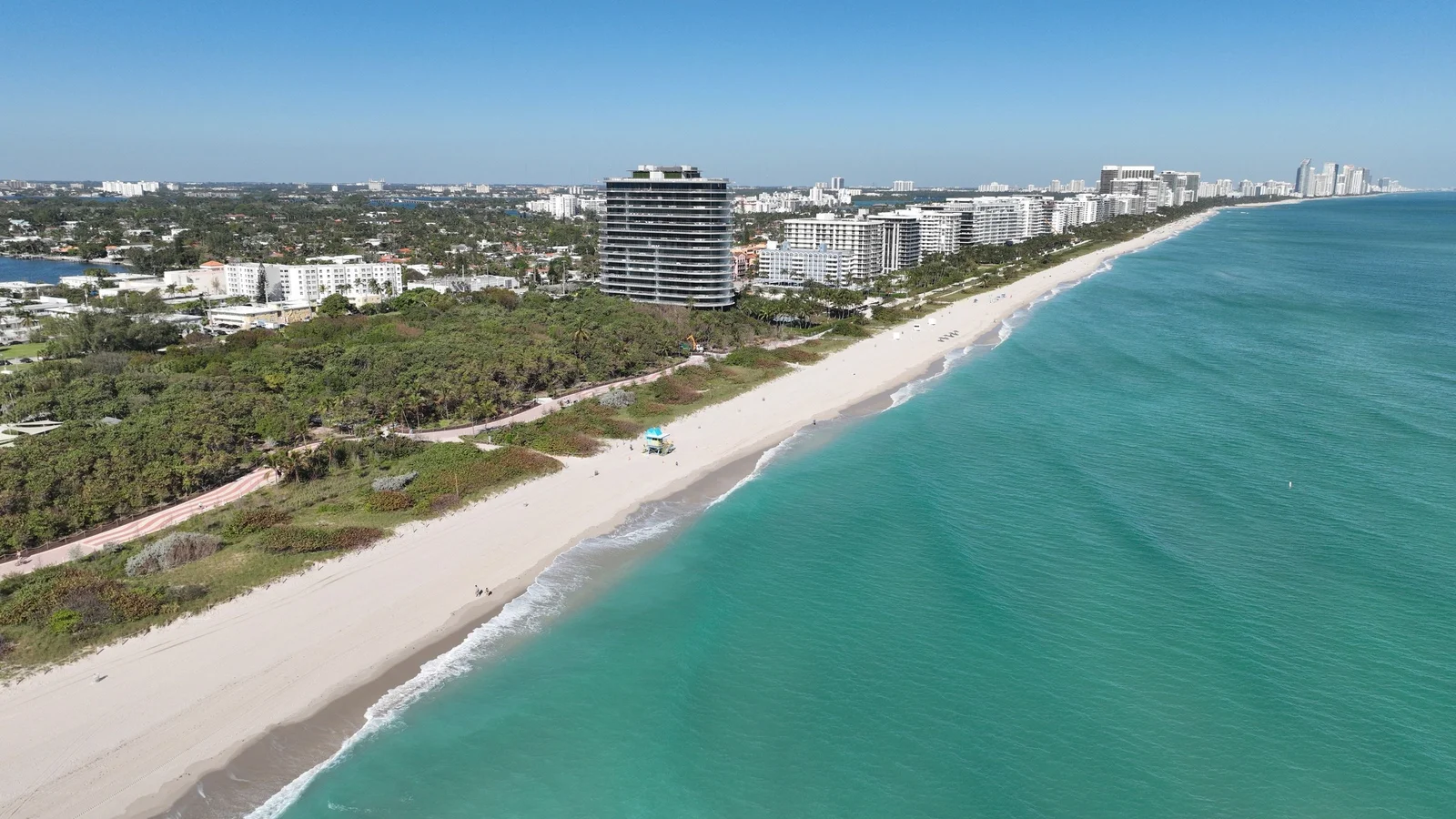 Aerial view of the North Shore beach in Miami Beach with condo buildings along the coast