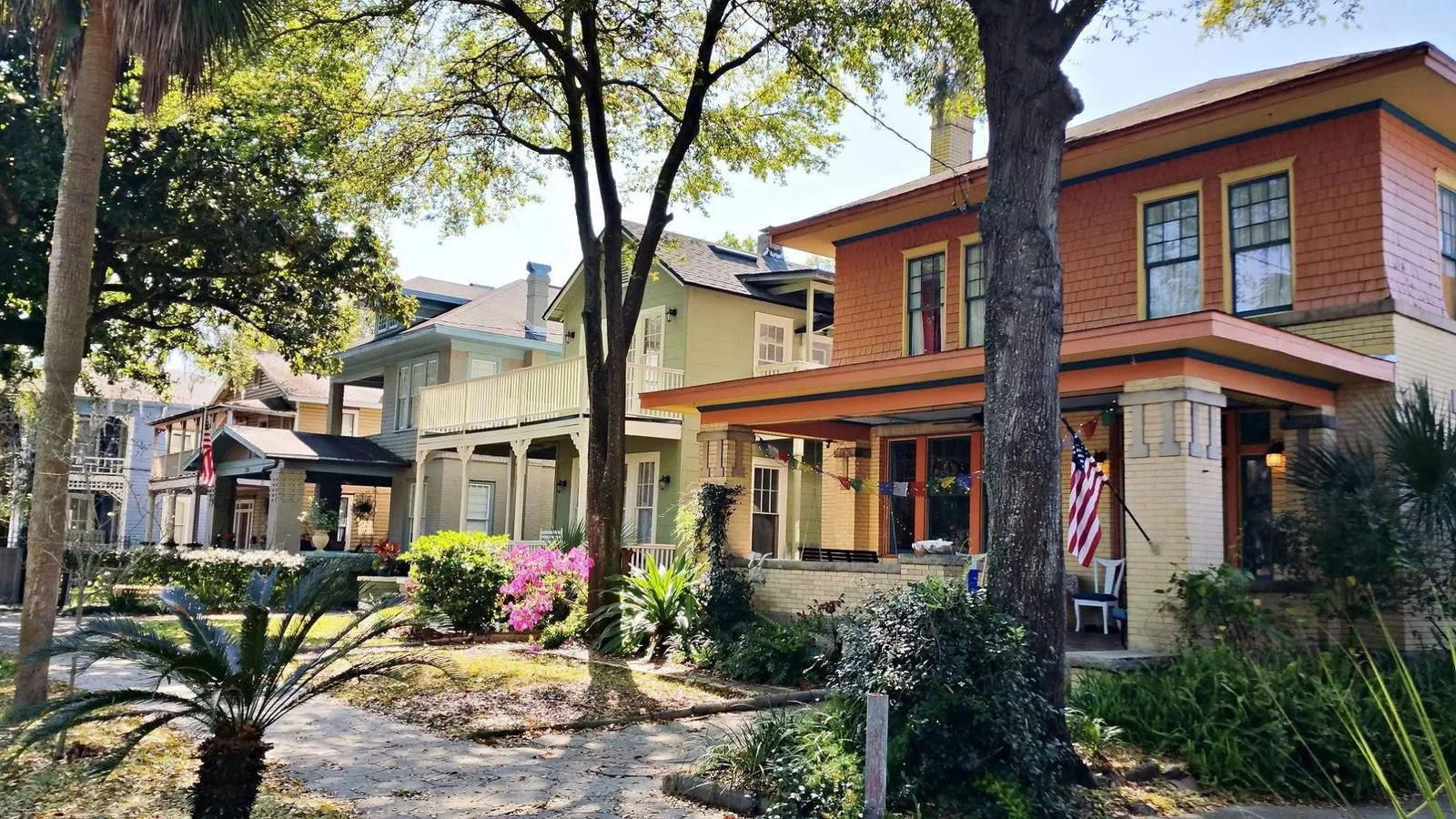 Historic early 1900s homes with porches on a tree-lined street in Springfield, Jacksonville.