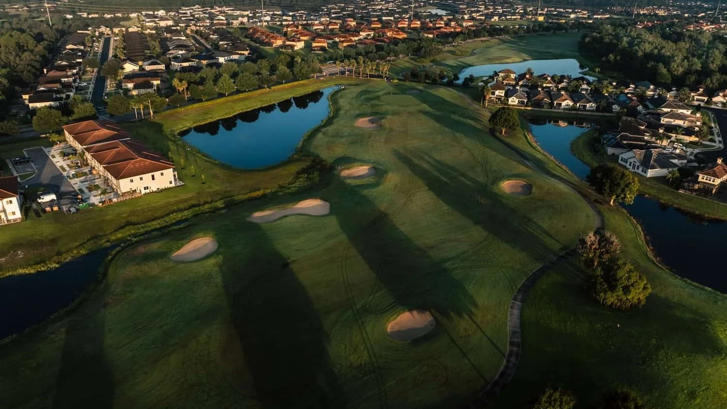 Aerial view of homes, lakes and golf fairways at Providence in Davenport, Polk County.