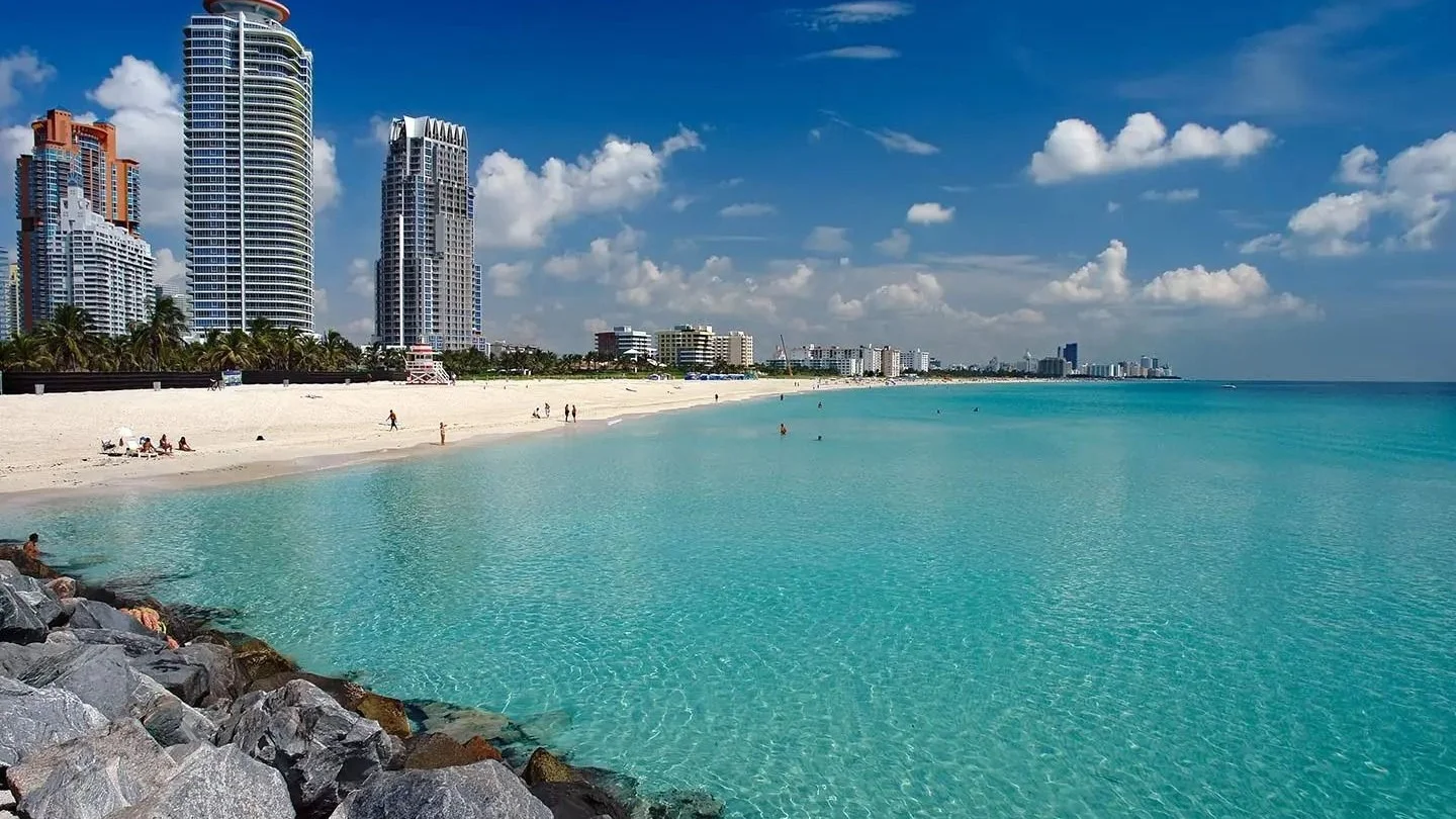 South Pointe beach in Miami Beach with condo towers behind the sand