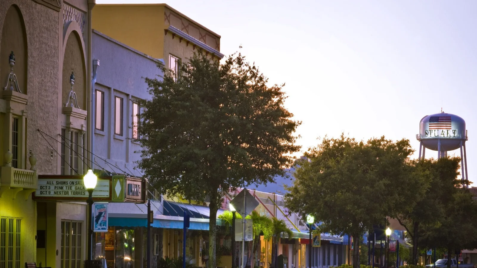 Downtown Stuart street at dusk with the Stuart water tower