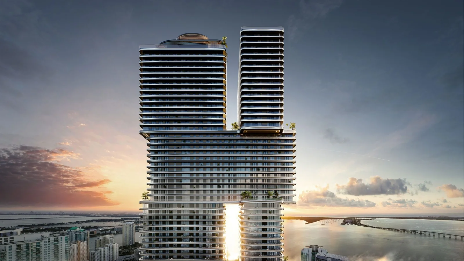Rendering of the Mercedes-Benz Places Miami towers at sunset beside Biscayne Bay.