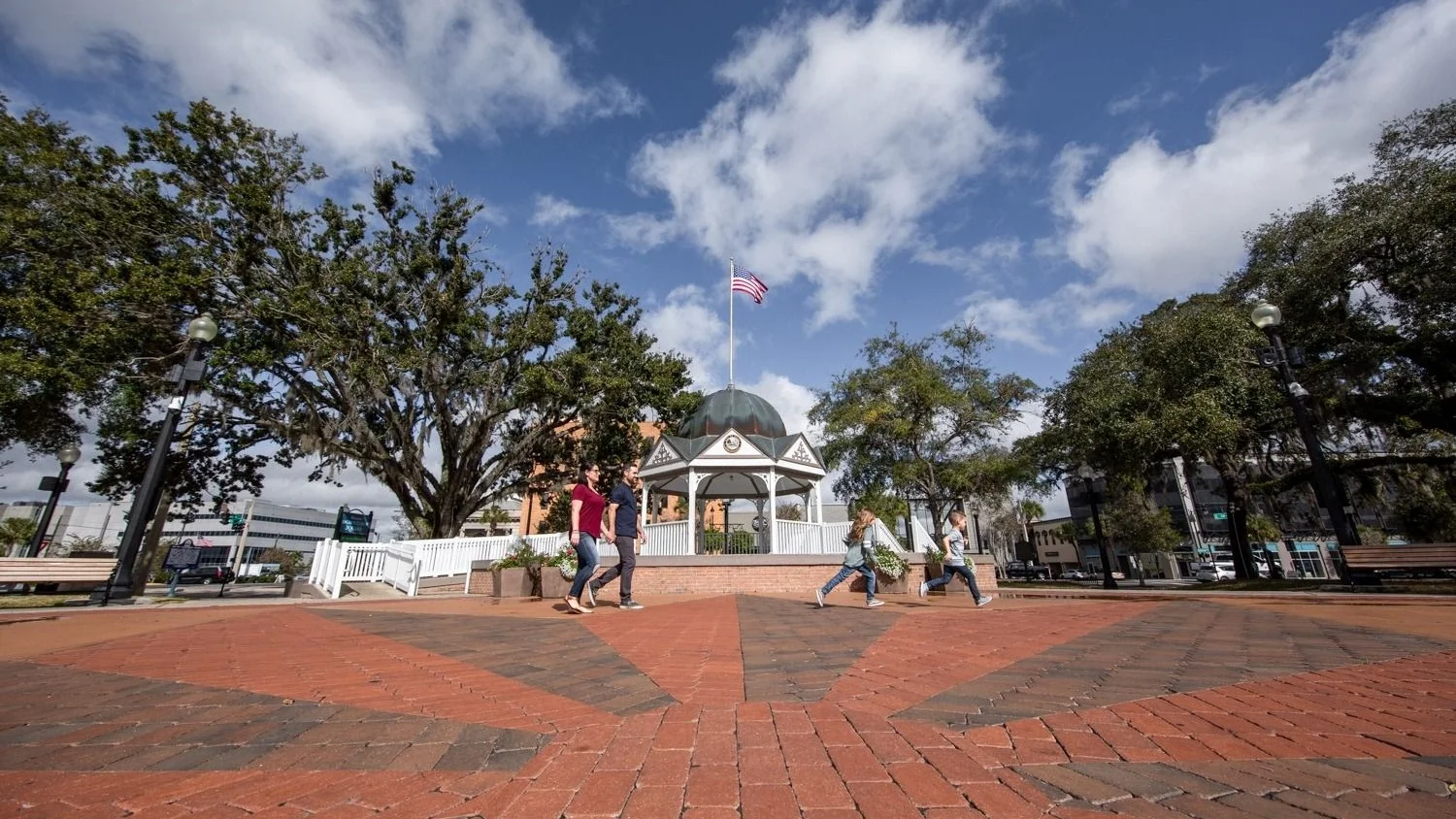 Brick plaza and gazebo on the downtown square in Ocala under old oak trees