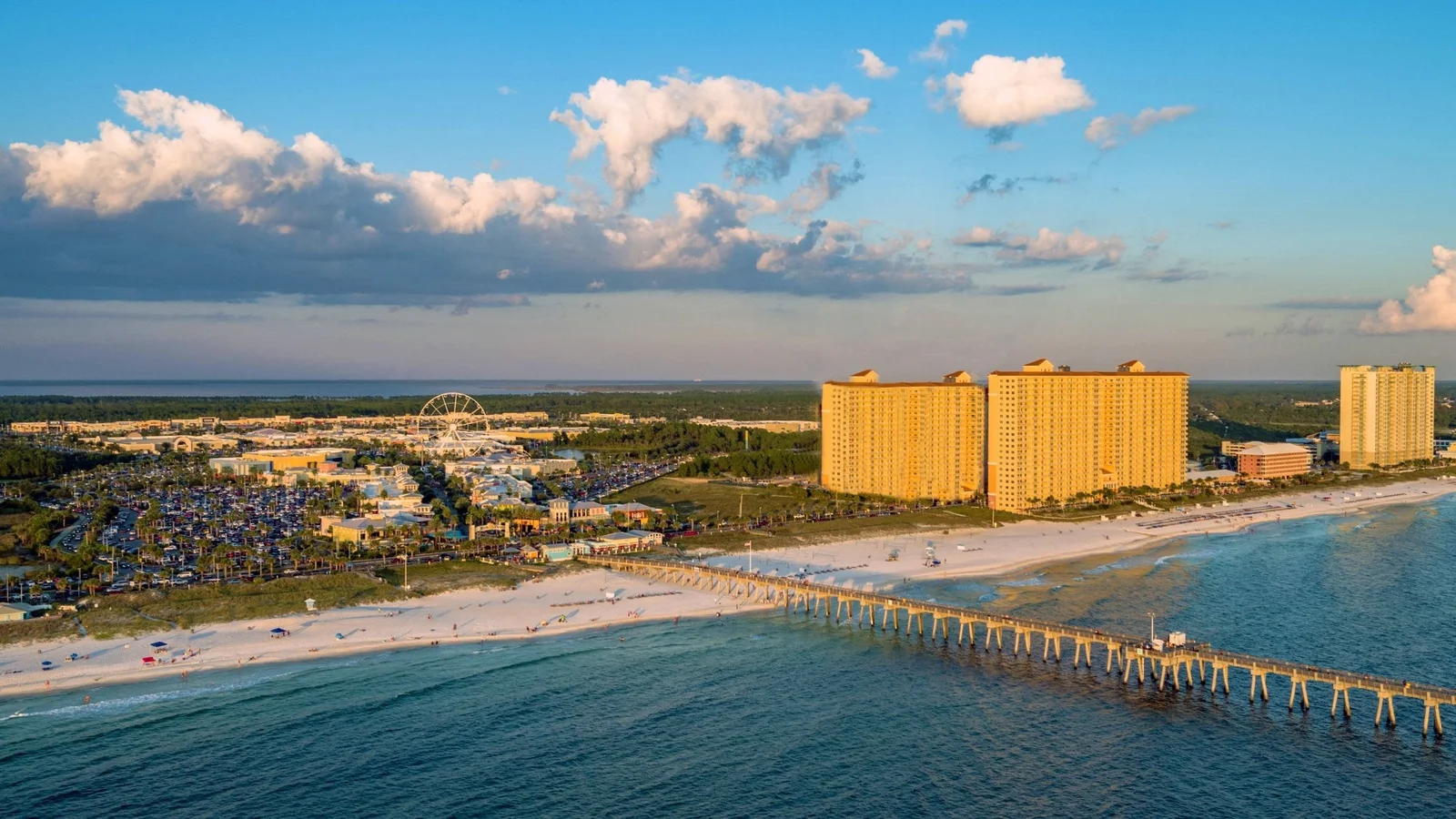 Aerial view of Pier Park, the City Pier and beachfront condo towers in Panama City Beach