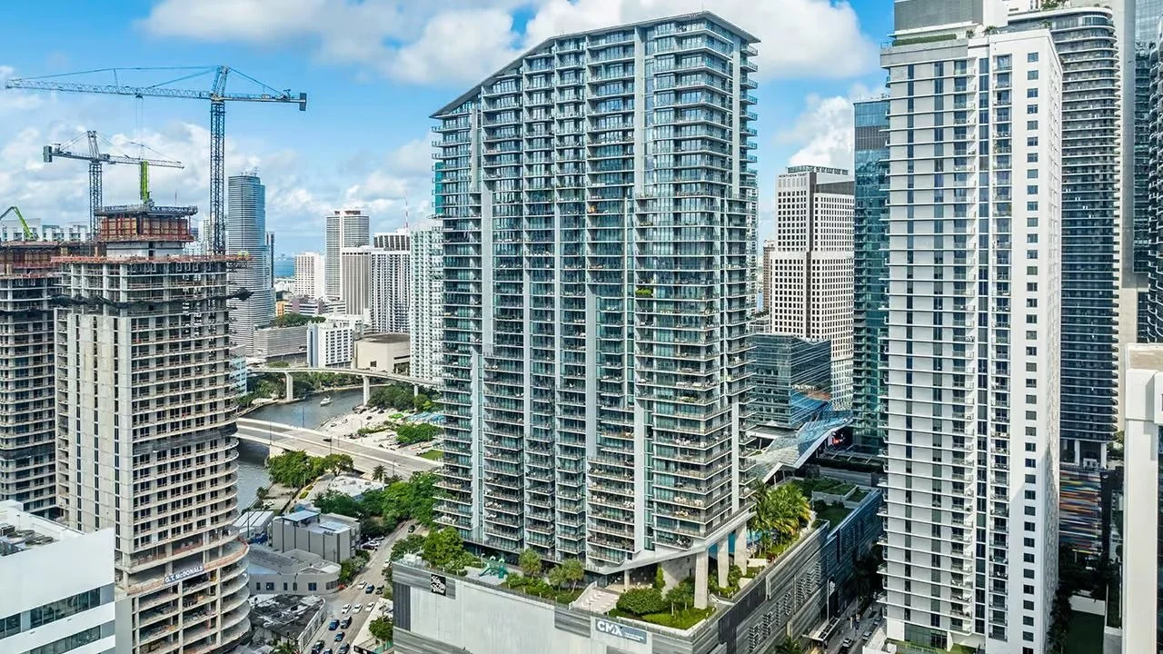 The Rise tower at Brickell City Centre seen from above among Brickell high-rises and the Miami River.