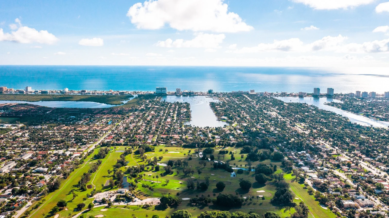 Aerial view of Hollywood residential neighbourhoods and a golf course near the ocean