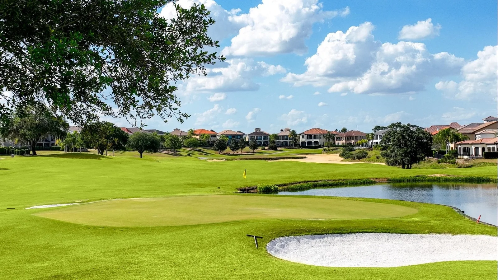 Golf green, lake and vacation homes at Reunion Resort, a nearby Osceola County golf community, shown in place of Stoneybrook South itself.