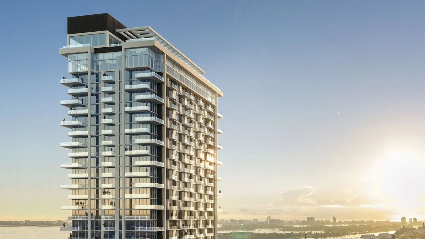 Rendering of The Crosby tower in Miami Worldcenter at sunrise, with the bay on the horizon.