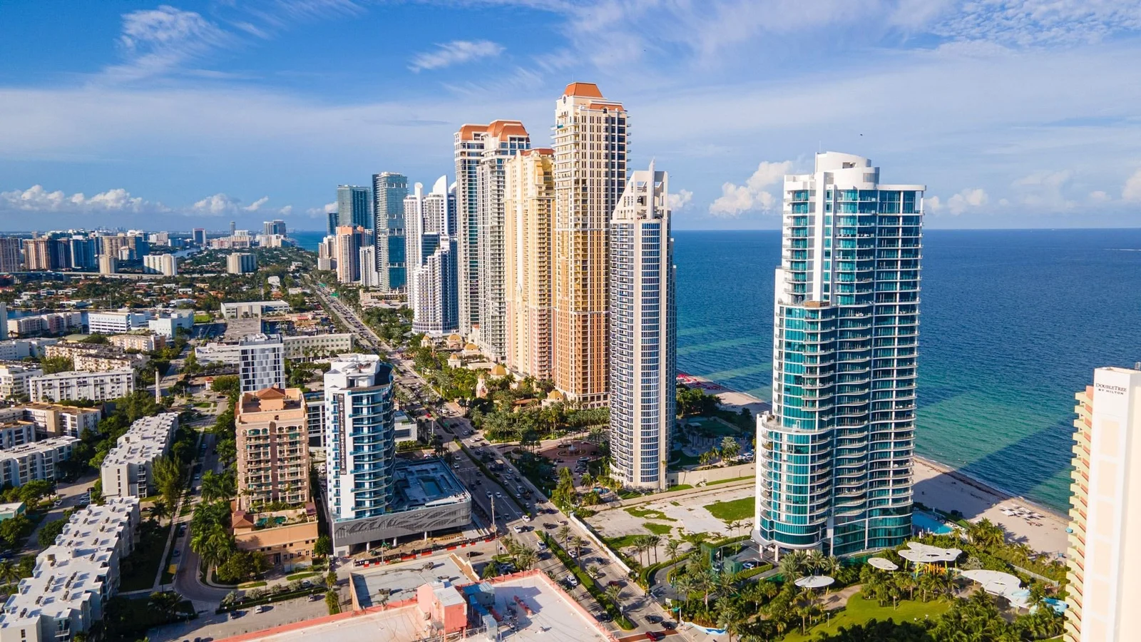 Oceanfront towers along Collins Avenue in Sunny Isles Beach; the photo shows the neighbourhood, not Turnberry Ocean Colony itself