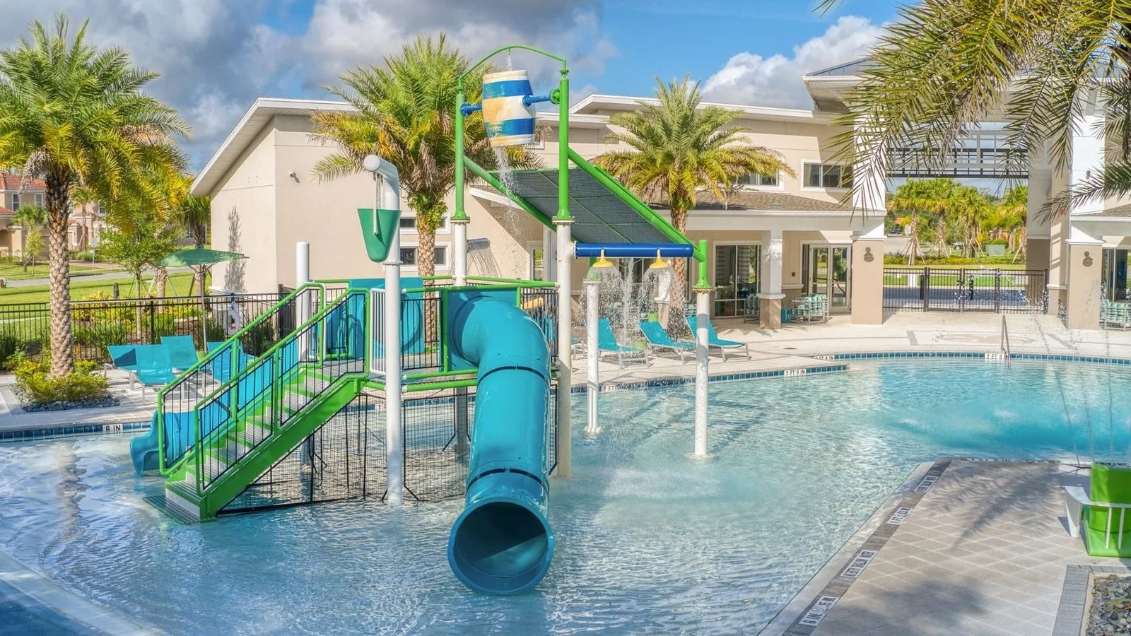 Veranda Palms resort pool with a water play structure and slides in Kissimmee.