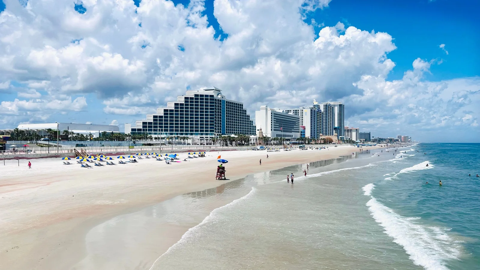 Daytona Beach with oceanfront hotels and condos along the wide sand beach