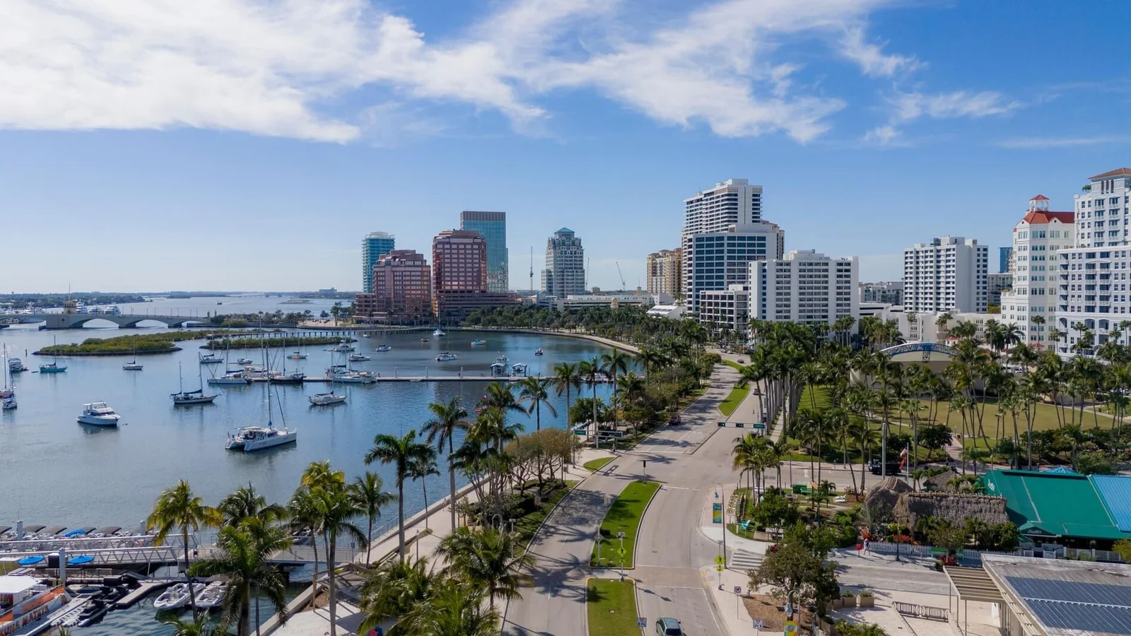 Downtown West Palm Beach towers and sailboats on the Intracoastal Waterway seen from Flagler Drive