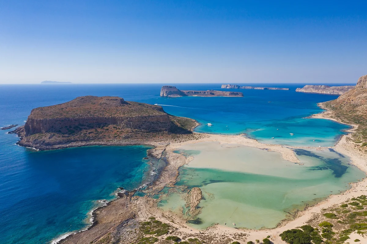 Crete vs Cyclades Greece Property Investment Guide — Greek Invest research illustration