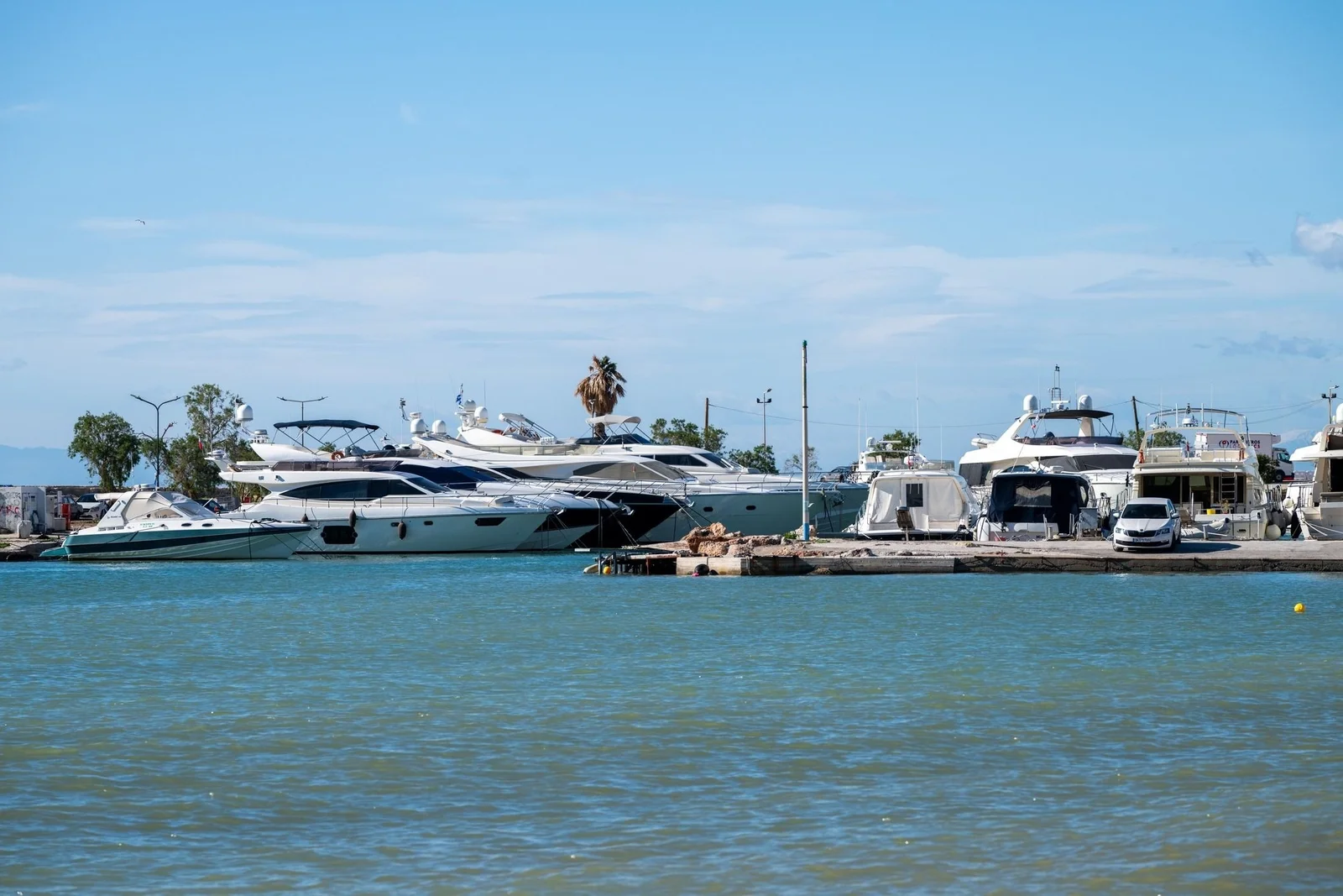 Motor yachts moored in a marina on the Glyfada waterfront, Athens Riviera