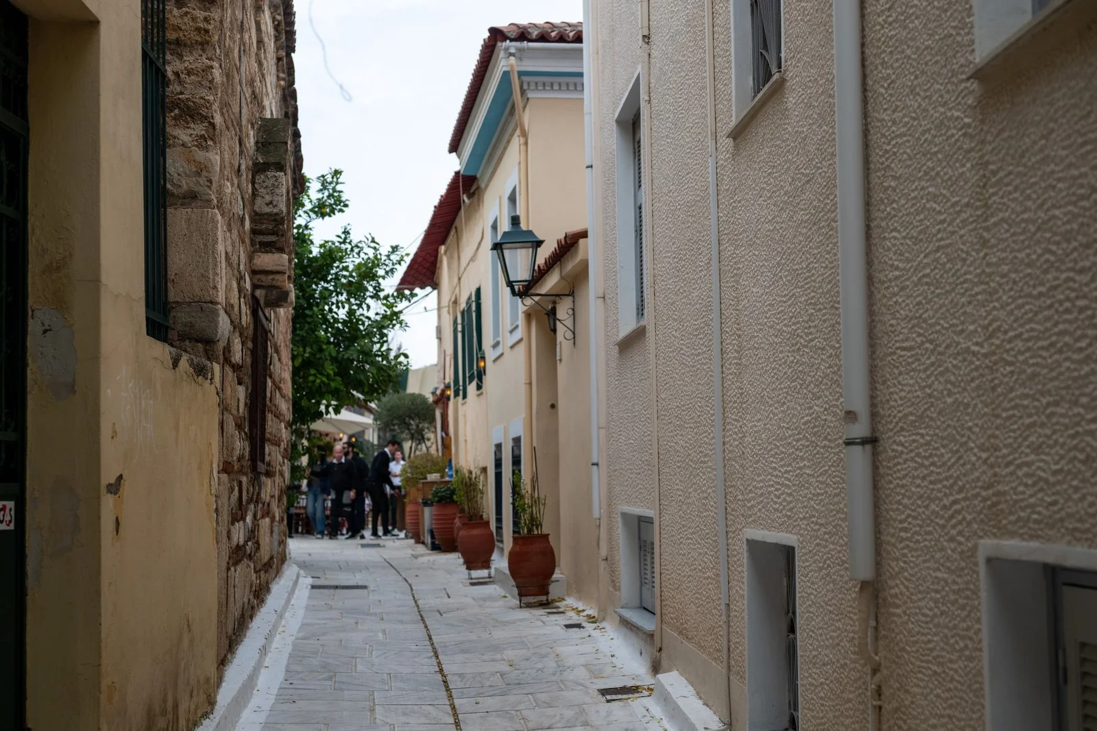 Narrow whitewashed alley in the old town of Athens