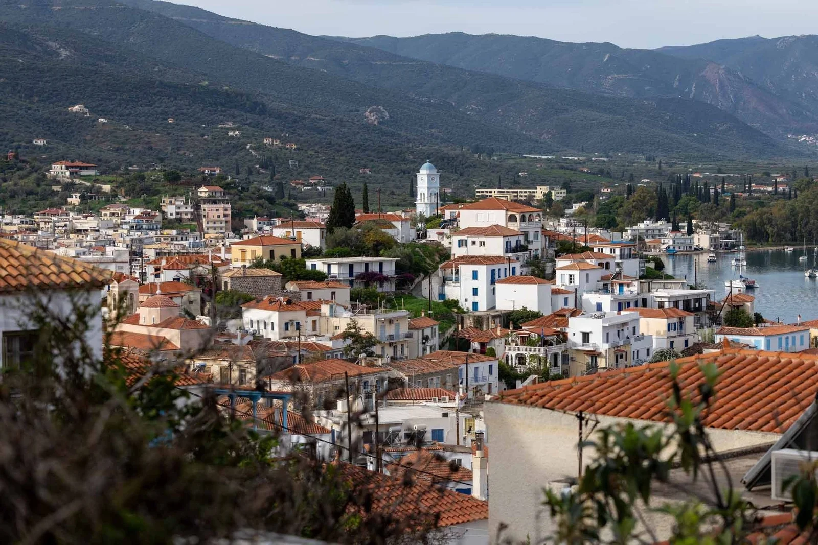 Poros town rooftops above the harbour