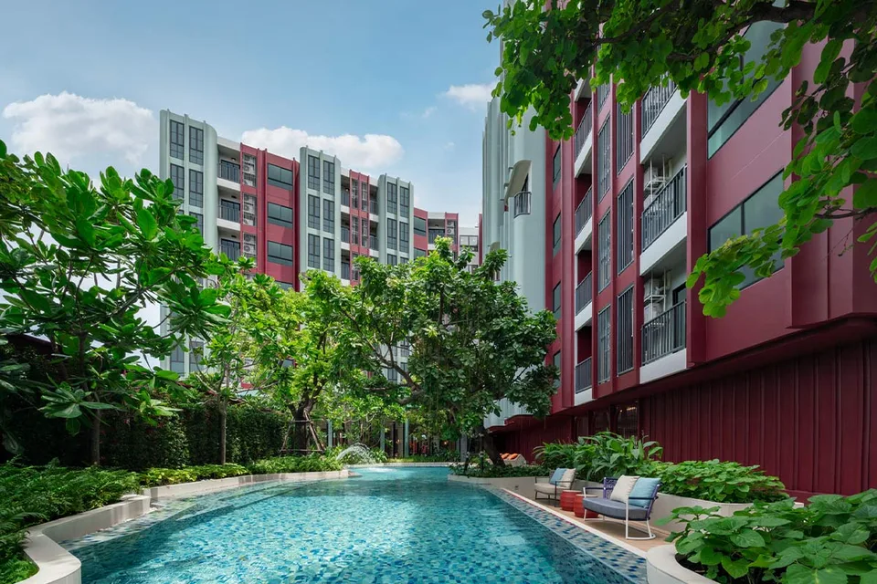 THE BASE Bukit by Sansiri, pool between the residential buildings