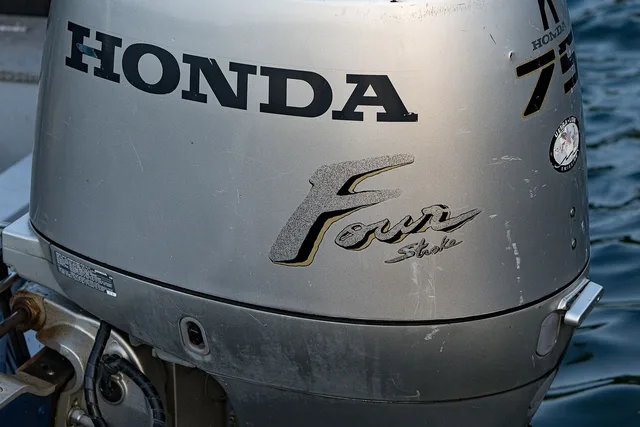 An outboard engine mounted on a boat transom