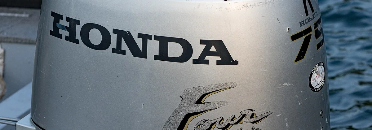 An outboard engine mounted on a boat transom