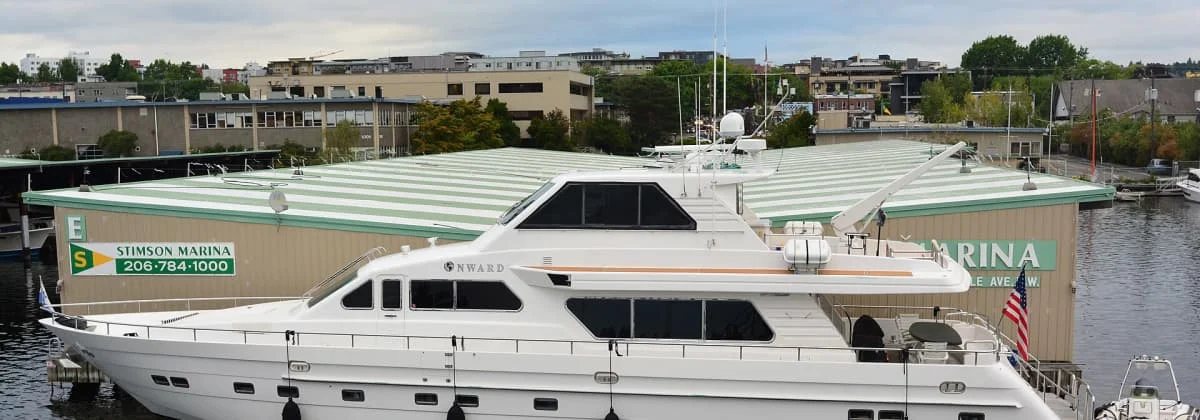 A motor yacht berthed at Stimson Marina in Seattle