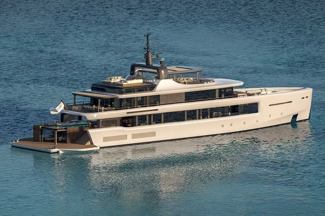 Benetti tri-deck superyacht at anchor on calm water