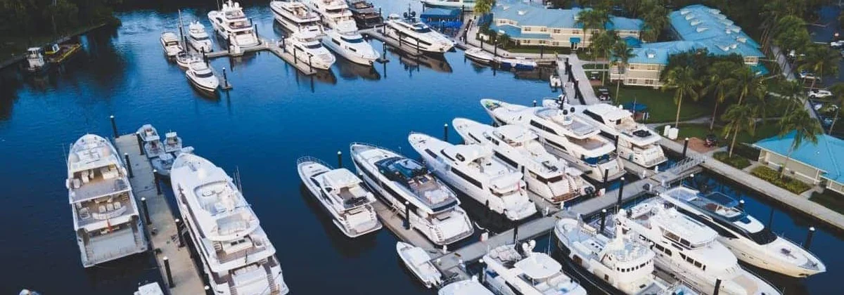 Motor yachts docked at the Lauderdale Marine Center yard in Fort Lauderdale