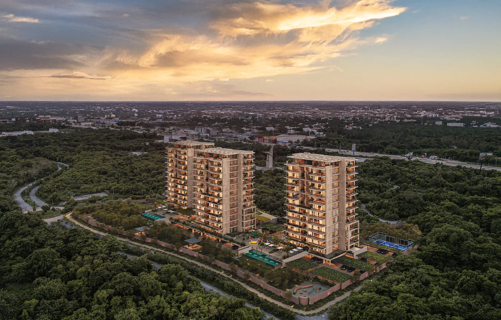 Aerial render of Zenit Cancún towers surrounded by green areas, with Cancún city behind