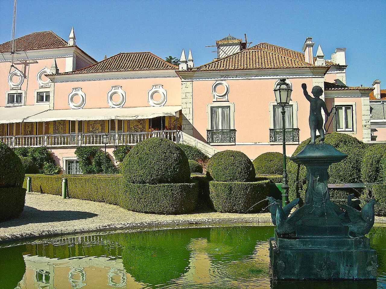 The pink façade and gardens of Belém Palace, Lisbon