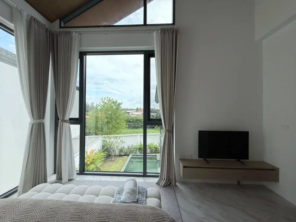 Rainpalm Villas master bedroom with pool access