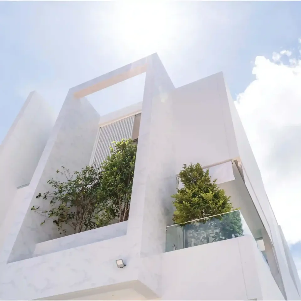 The Residence Prime villa exterior, spacious pool terrace and tropical landscaping in Layan