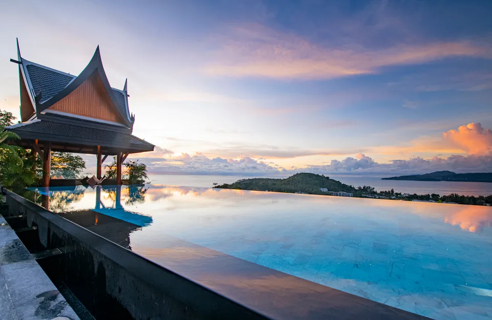 Baan Phu Prana, infinity pool and Thai sala at sunset, Surin