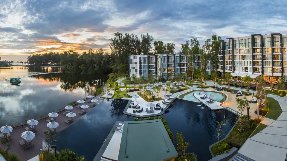 Cassia Phuket, pool and lagoon at dusk