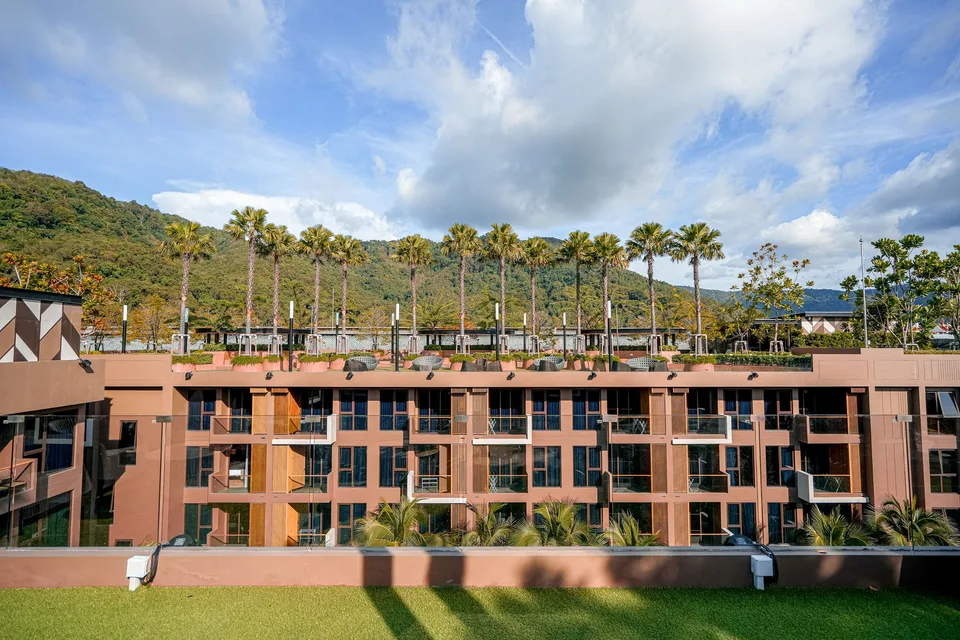 The Marin Phuket, Kamala: residence block facade with rooftop palms