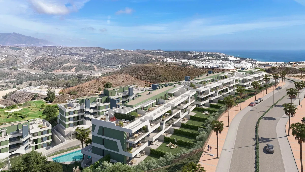Bahia by Kronos Homes in La Cala de Mijas: aerial view of the terraced blocks, pool and sea