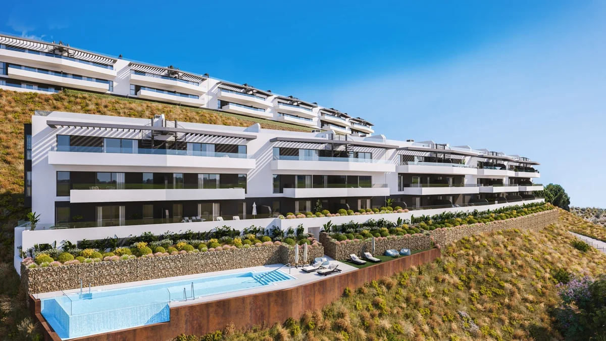 Bali by Kronos Homes terraced apartment blocks and infinity pool on the hillside of Rincon de la Victoria