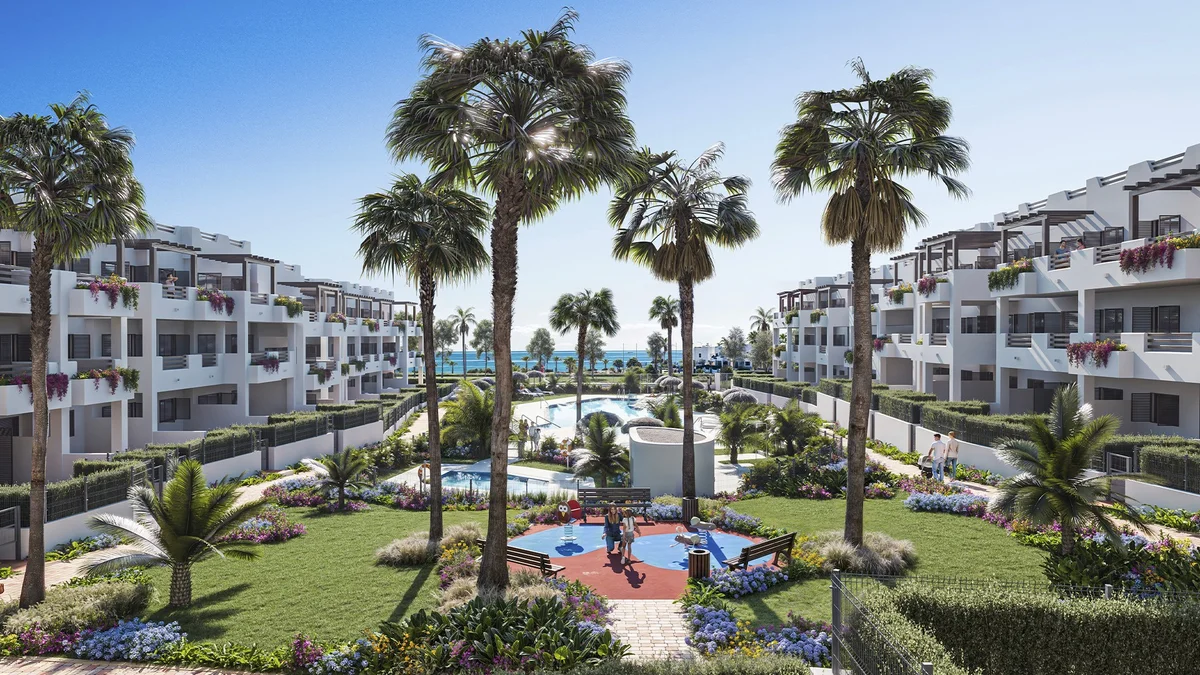 Palm gardens between apartment blocks at Mar de Pulpi, San Juan de los Terreros, Almeria