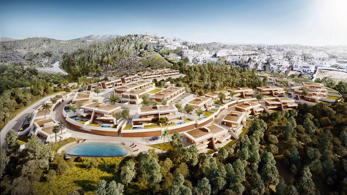 Aerial view of Eden by Kronos Homes, villas and townhouses among pine woods in Mijas