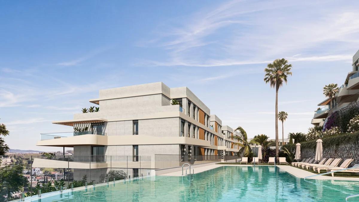 Kalifornia by Kronos Homes in Estepona, pool and terraced apartment block