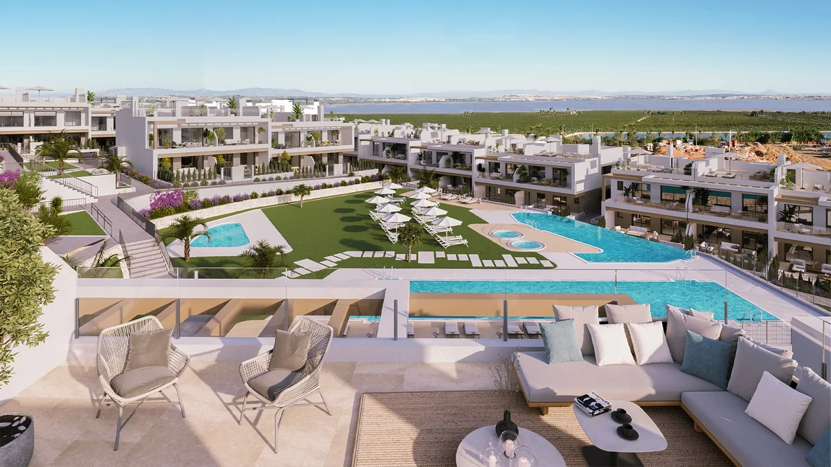 Solarium terrace overlooking pools at Coronella Living, Torrevieja
