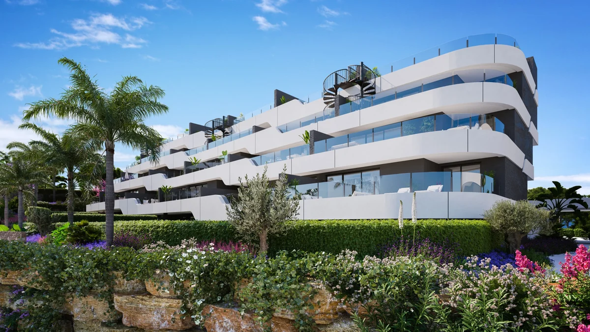 Oasis 325 apartment building with rounded terraces and gardens, Estepona