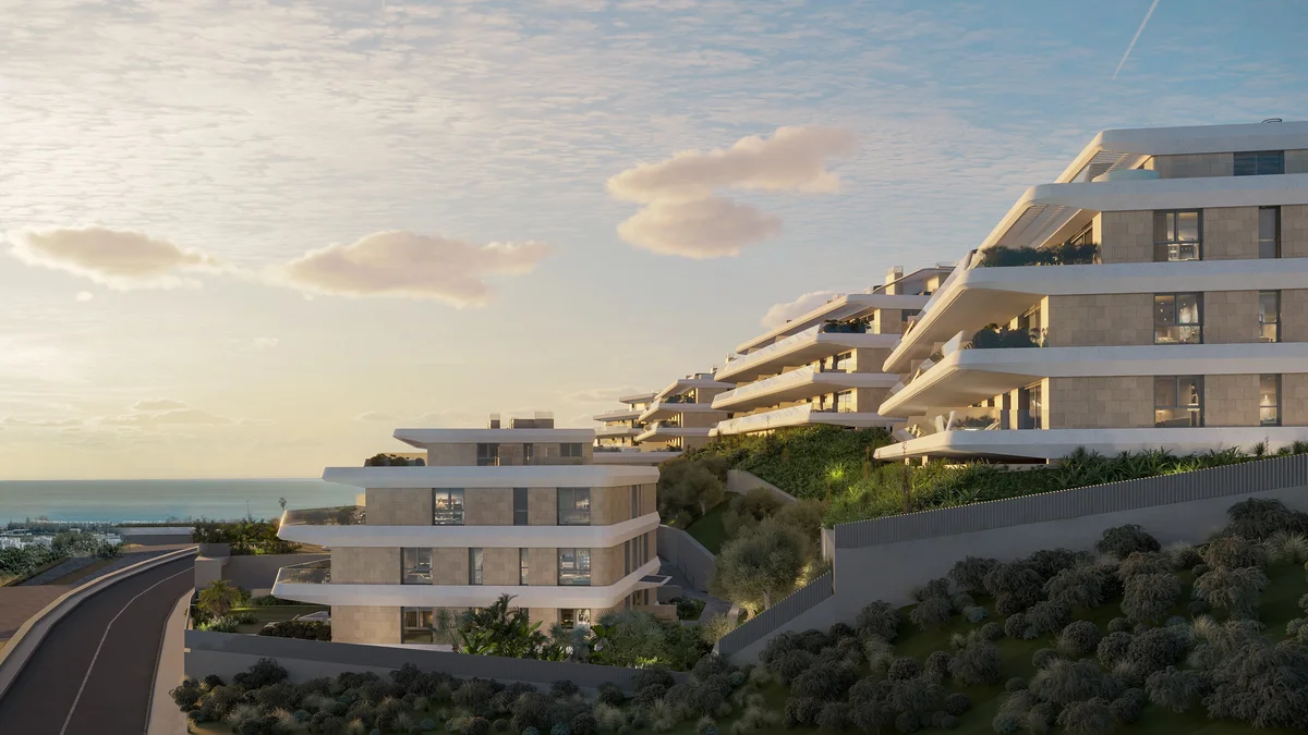 Libella apartments in Estepona: stepped terraces above the coast at sunset